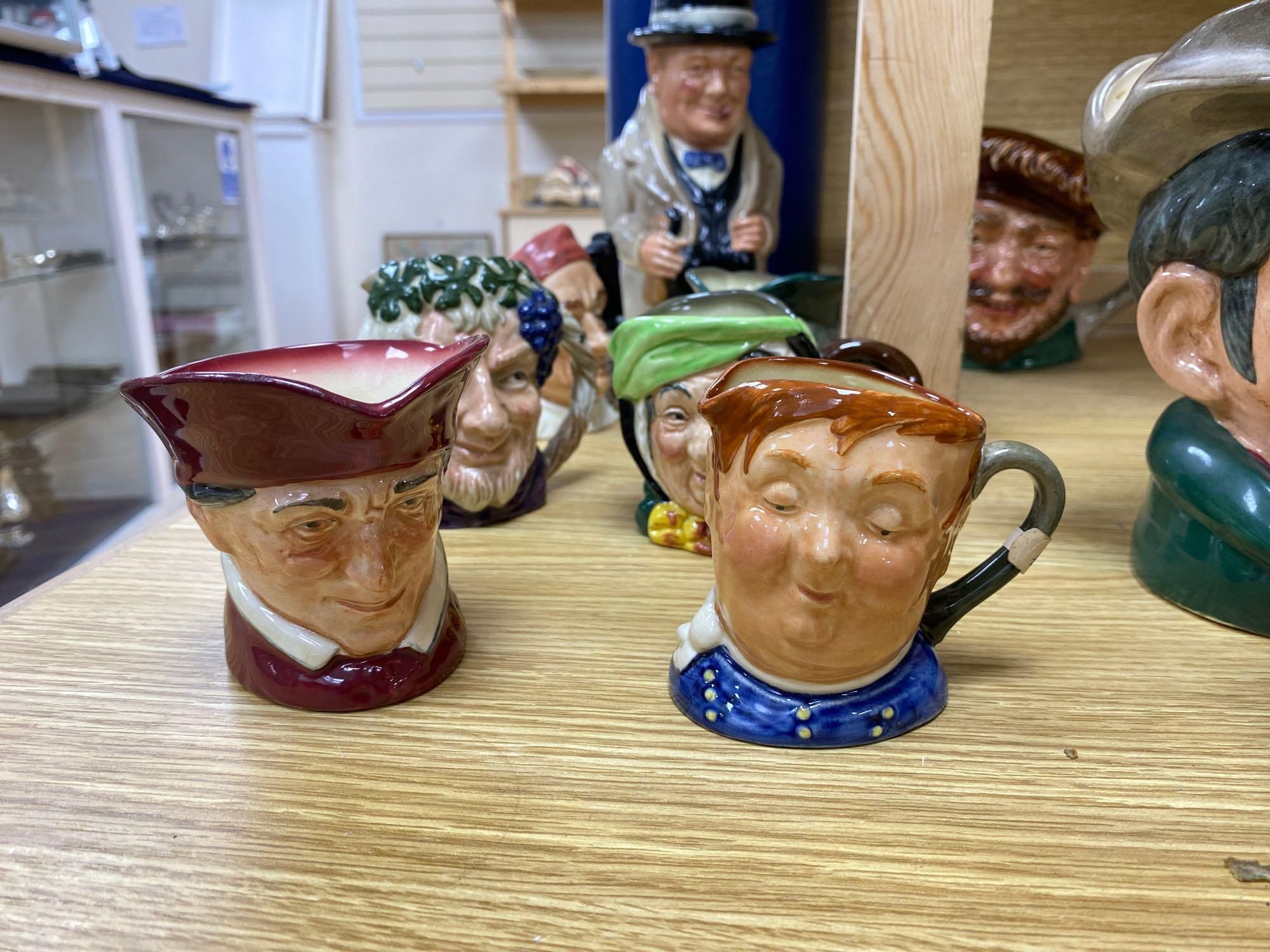 Twelve Royal Doulton character mugs and a Toby jug , Winston Churchill